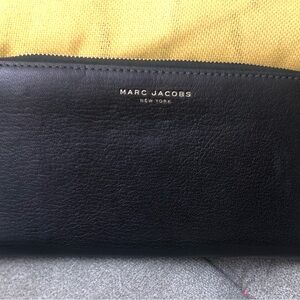 Authentic Marc Jacobs Wallet in Black with Gold Hardware. Mint condition.